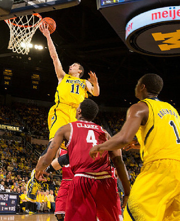 Nik Stauskas (11) and Glenn Robinson III (1)