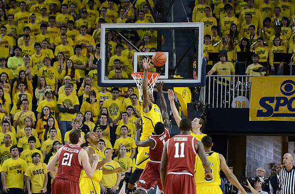 Jon Horford (15), Glenn Robinson III (1), Nik Stauskas (11), and Trey Burke (3)