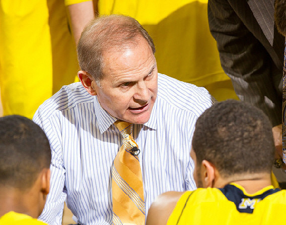 John Beilein, Trey Burke (3), and Jordan Morgan (52)