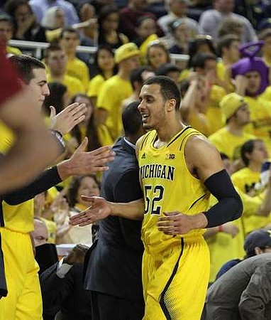 Mitch McGary (4) and Jordan Morgan (52)