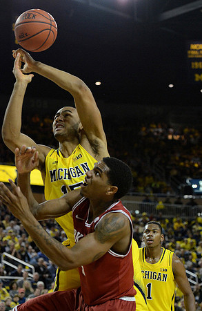 Jon Horford (15) and Glenn Robinson III (1)
