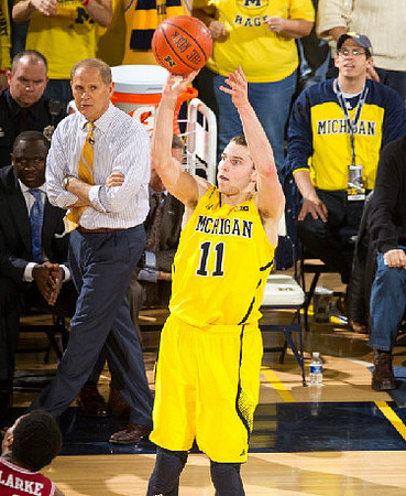Nik Stauskas (11), John Beilein, and Bacari Alexander