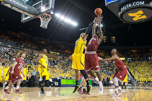 Jordan Morgan (52) and Glenn Robinson III (1)