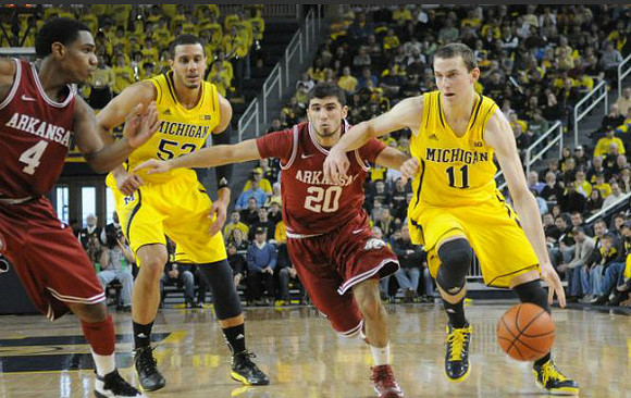 Jordan Morgan (52) and Nik Stauskas (11)