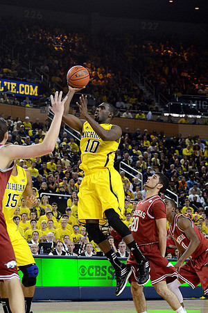 Jon Horford (15) and Tim Hardaway Jr. (10)