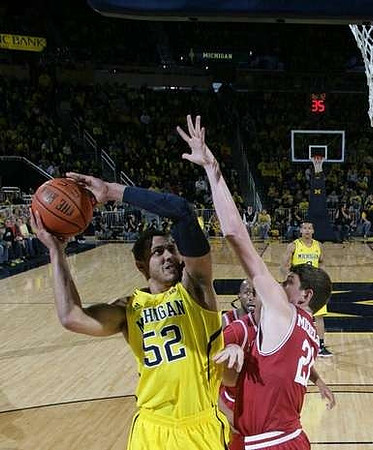 Glenn Robinson III (1) and Trey Burke (3)
