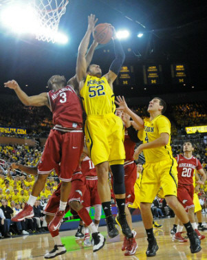 Jordan Morgan (52) and Mitch McGary (4)