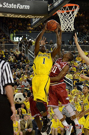 Glenn Robinson III (1) and Trey Burke (3)