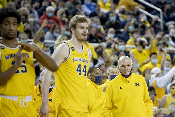 Jace Howard (25), Jaron Faulds (44), and Phil Martelli