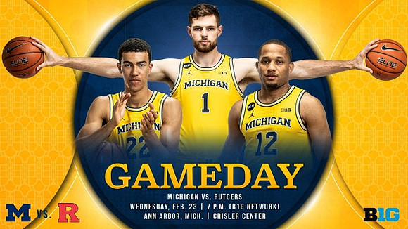 Caleb Houstan (22), Hunter Dickinson (1), and DeVante' Jones (12)