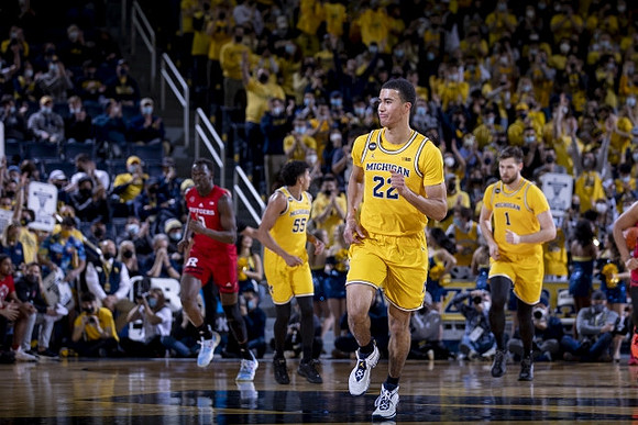 Eli Brooks (55), Caleb Houstan (22), and Hunter Dickinson (1)