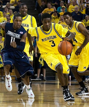 Manny Harris (3), Laval Lucas-Perry (31), and DeShawn Sims (34)
