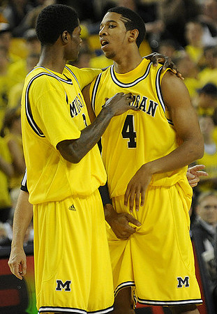 Manny Harris (3) and Darius Morris (4)