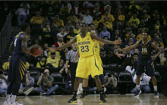 Caris LeVert (23) and Jordan Morgan (52)