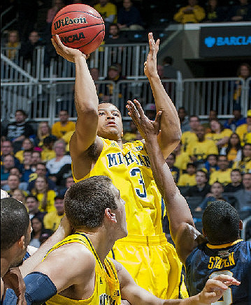 Trey Burke (3) and Mitch McGary (4)