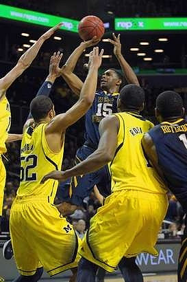 Jordan Morgan (52) and Glenn Robinson III (1)