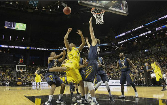 Nik Stauskas (11), Tim Hardaway Jr. (10), and Trey Burke (3)