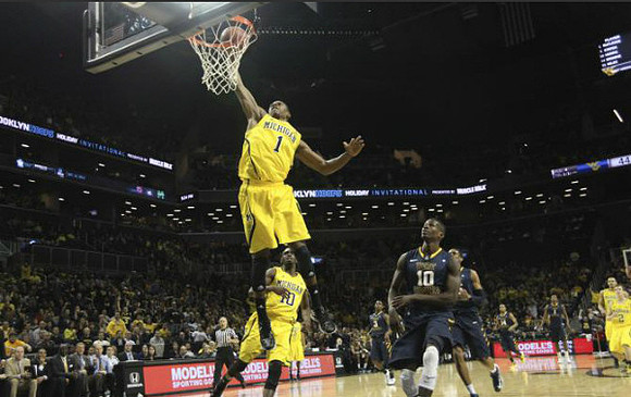 Glenn Robinson III (1), Tim Hardaway Jr. (10), Spike Albrecht (2), and Jordan Morgan (52)