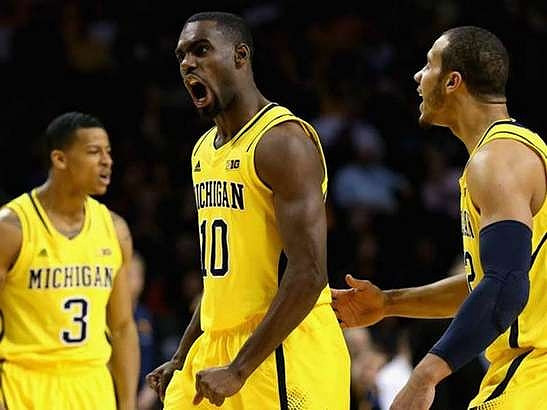 Trey Burke (3), Tim Hardaway Jr. (10), and Jordan Morgan (52)