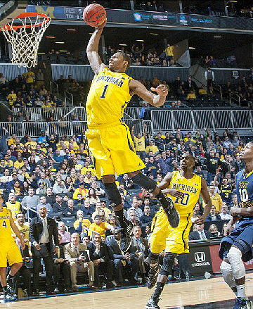 Glenn Robinson III (1), Tim Hardaway Jr. (10), and Mitch McGary (4)