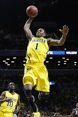 Glenn Robinson III (1) and Tim Hardaway Jr. (10)