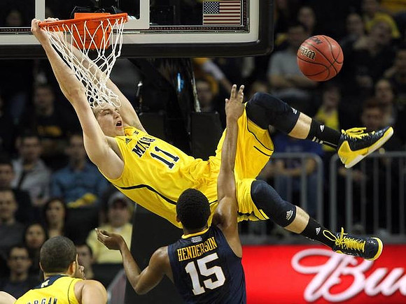 Nik Stauskas (11) and Jordan Morgan (52)