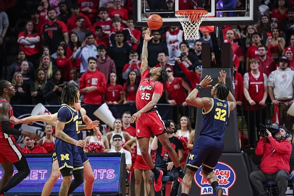 Dug McDaniel (0) and Tarris Reed Jr. (32)