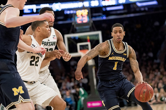 Jon Teske (15) and Charles Matthews (1)
