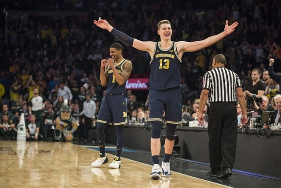 Charles Matthews (1) and Moritz Wagner (13)