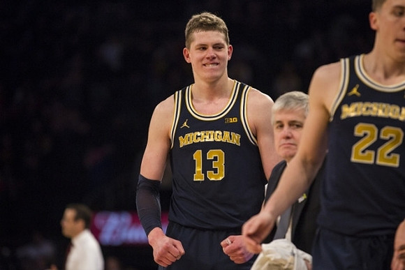 Moritz Wagner (13) and Duncan Robinson (22)