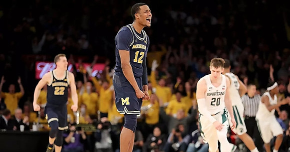 Duncan Robinson (22) and Muhammad-Ali Abdur-Rahkman (12)