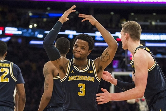Muhammad-Ali Abdur-Rahkman (12), Charles Matthews (1), Zavier Simpson (3), and Moritz Wagner (13)