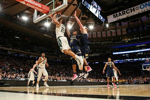 Muhammad-Ali Abdur-Rahkman (12), Moritz Wagner (13), and Jaaron Simmons (5)