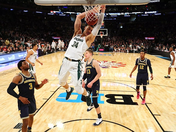 Zavier Simpson (3), Moritz Wagner (13), and Muhammad-Ali Abdur-Rahkman (12)
