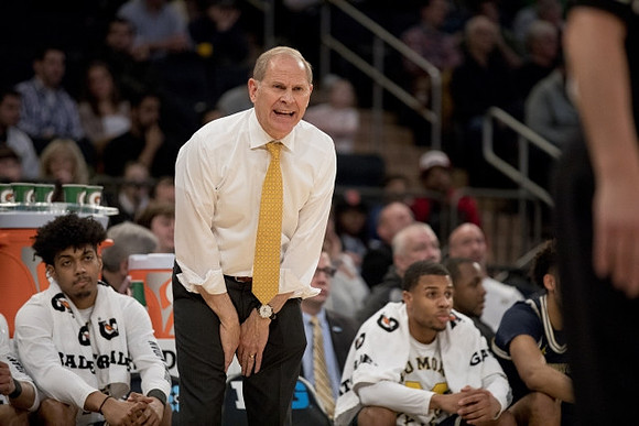 Ibi Watson (23), John Beilein, and Jaaron Simmons (5)
