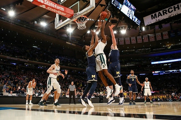 Charles Matthews (1), Moritz Wagner (13), and Zavier Simpson (3)