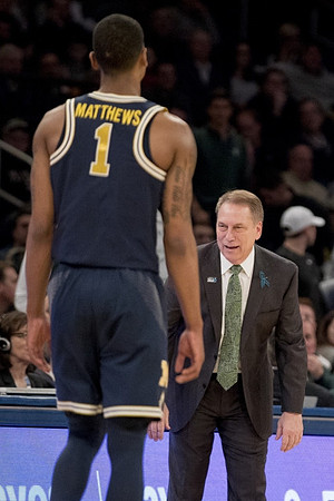 Charles Matthews (1) and Michigan State Head Coach Tom Izzo