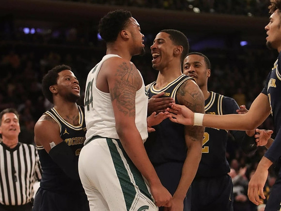 Zavier Simpson (3), Charles Matthews (1), Muhammad-Ali Abdur-Rahkman (12), and Isaiah Livers (4)