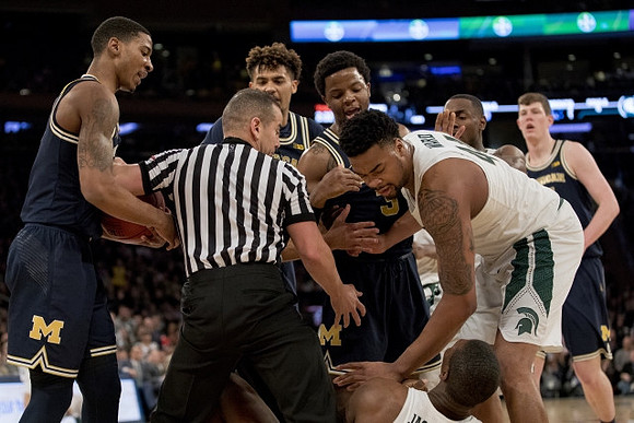 Charles Matthews (1), Isaiah Livers (4), Zavier Simpson (3), and Jon Teske (15)