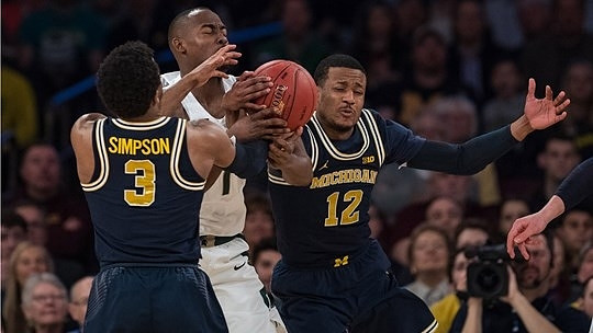 Zavier Simpson (3) and Muhammad-Ali Abdur-Rahkman (12)