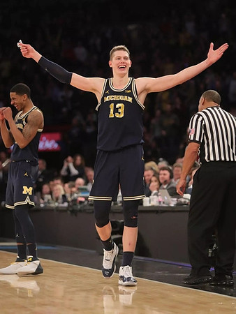 Charles Matthews (1) and Moritz Wagner (13)