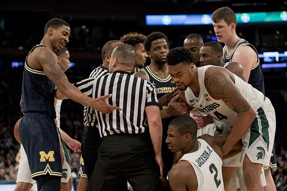 Charles Matthews (1), Isaiah Livers (4), Zavier Simpson (3), and Jon Teske (15)