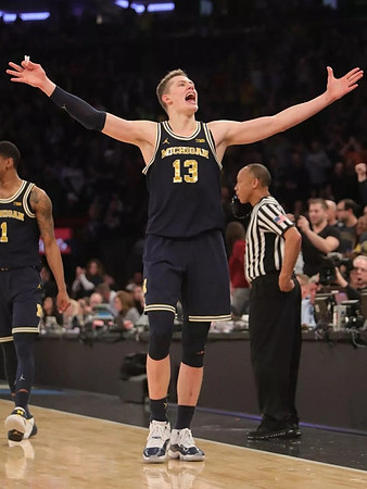 Charles Matthews (1) and Moritz Wagner (13)