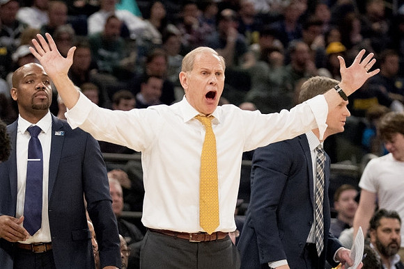 Deandre Haynes, John Beilein, and Luke Yaklich
