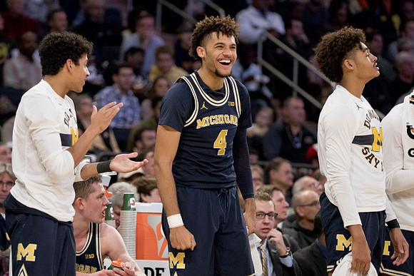 Eli Brooks (55), Moritz Wagner (13), Isaiah Livers (4), and Jordan Poole (2)