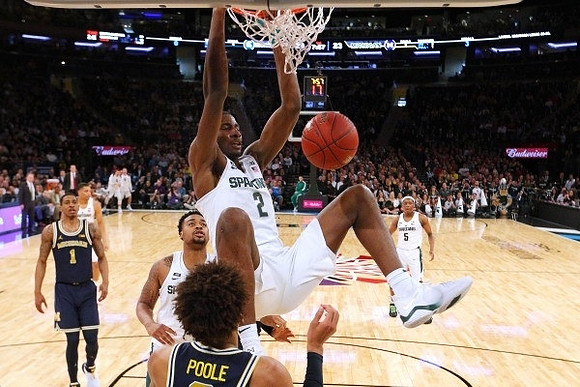 Charles Matthews (1) and Jordan Poole (2)