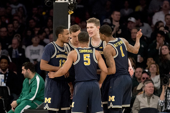 Muhammad-Ali Abdur-Rahkman (12), Jaaron Simmons (5), Duncan Robinson (22), Moritz Wagner (13), and Charles Matthews (1)