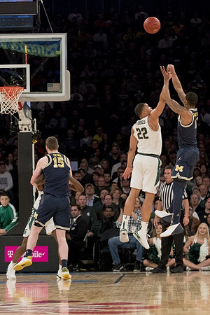 Jon Teske (15) and Charles Matthews (1)