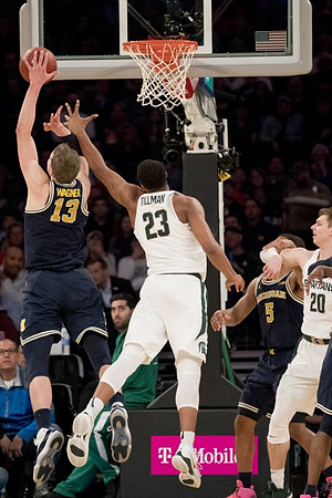 Moritz Wagner (13) and Jaaron Simmons (5)