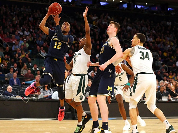 Muhammad-Ali Abdur-Rahkman (12) and Jon Teske (15)